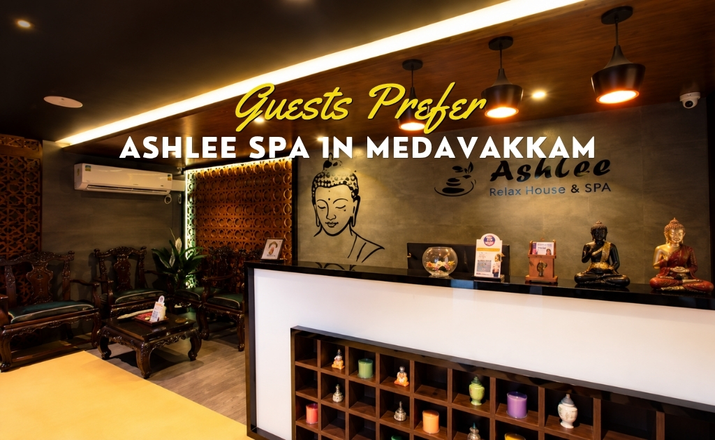 Luxury spa reception interior at Ashlee Spa in Medavakkam featuring warm ambient lighting, elegant wooden decor, relaxing wellness atmosphere, Buddha art wall design, premium massage spa lobby, and modern spa seating area.